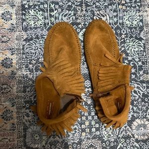 Tan light brown Minnetonka moccasin ankle booties with side zipper